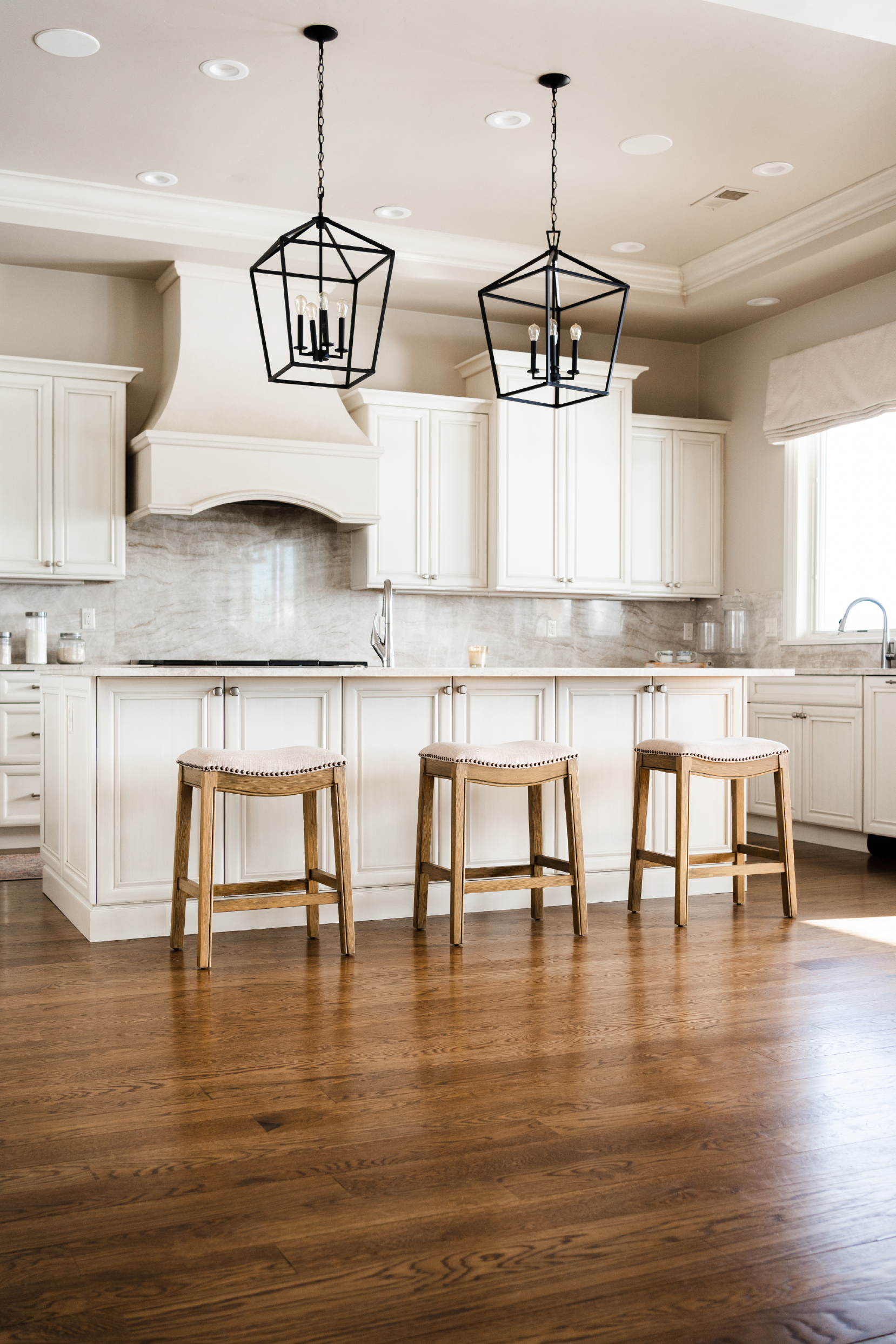 Adrien Saddle Counter Height Kitchen Stool - Natural Wood Finish With Wheat Fabric Upholstery in Stools by Maven Lane