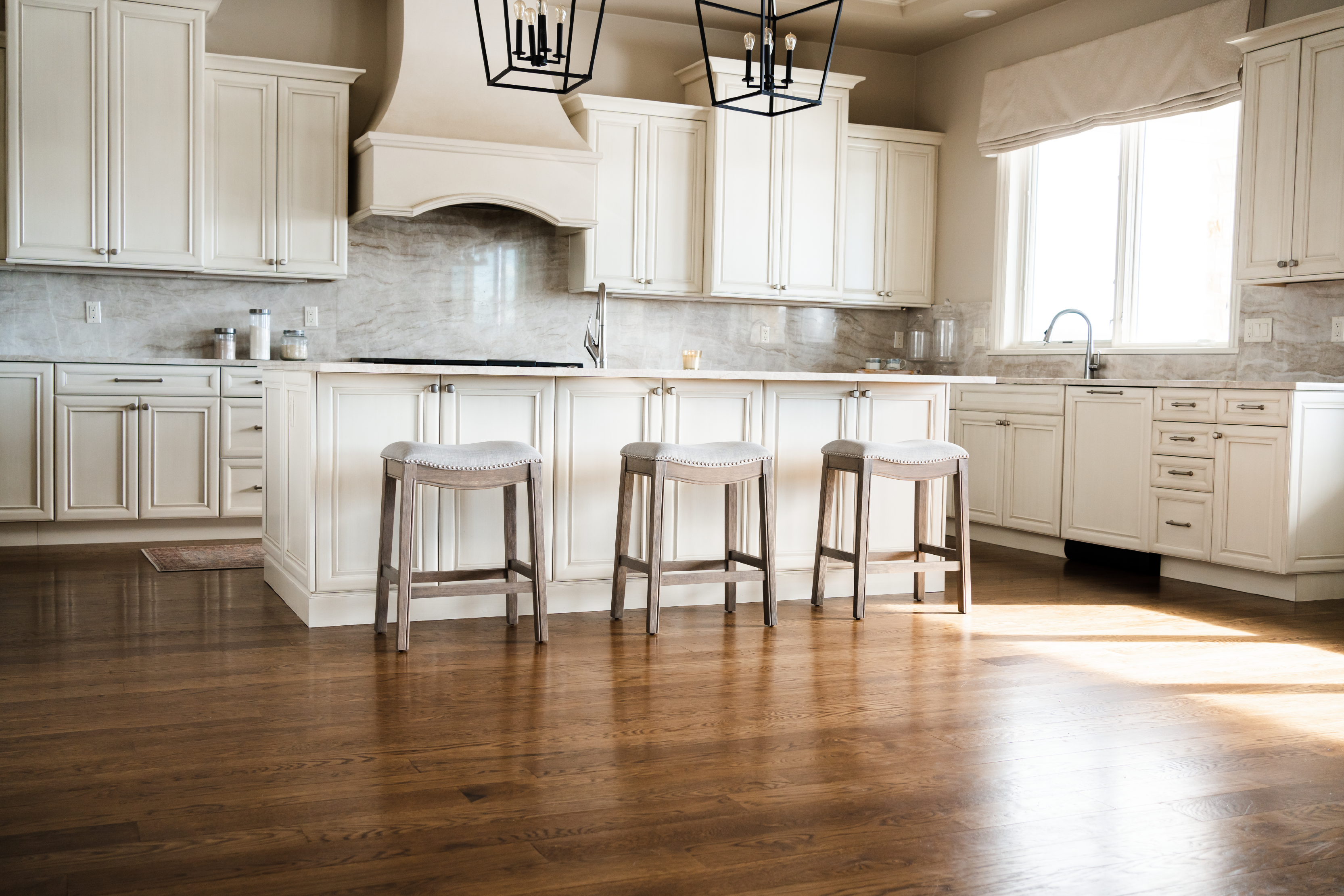 Adrien Saddle Counter Height Kitchen Stool - Reclaimed Oak Finish With Ash Grey Fabric Upholstery in Stools by Maven Lane