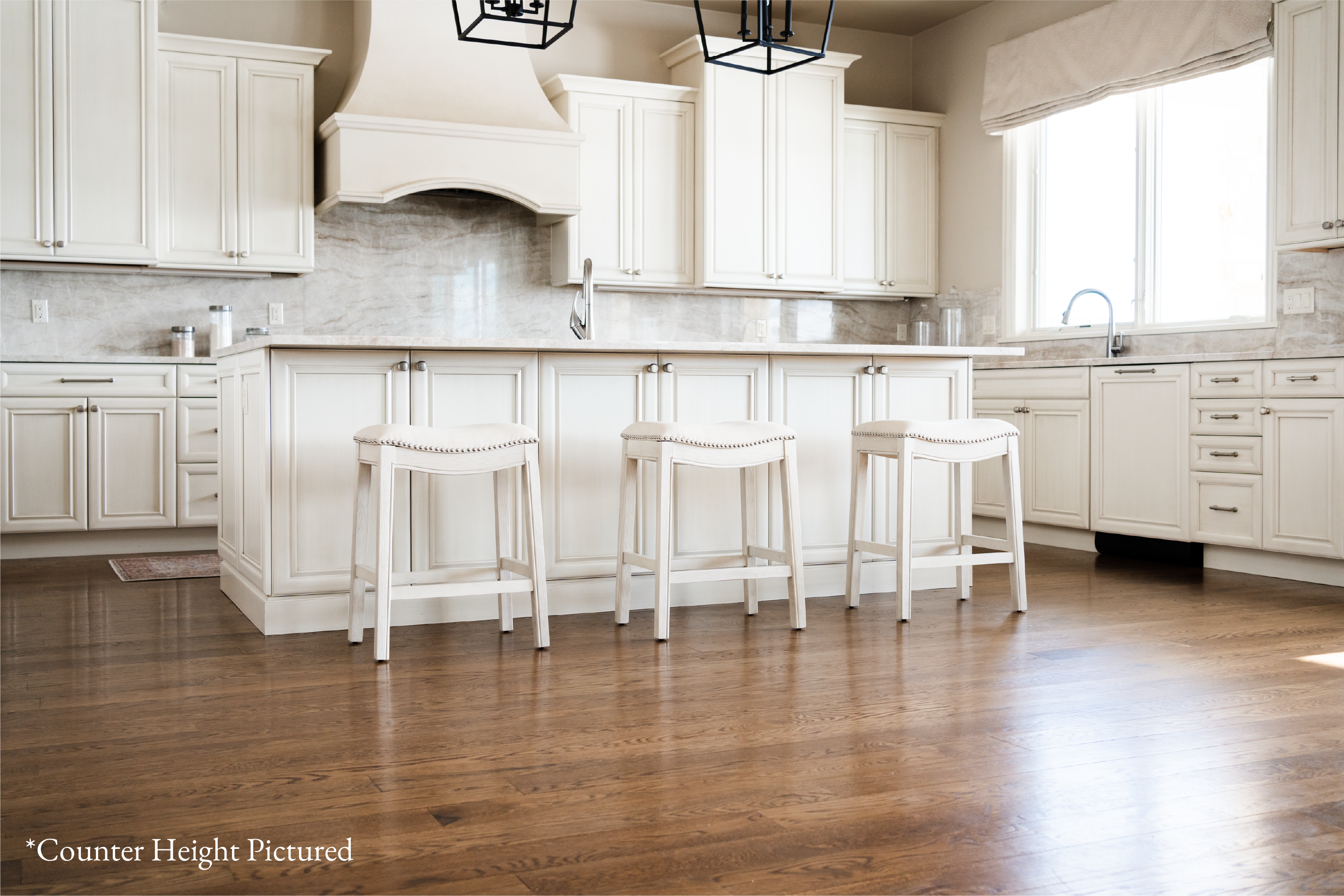 Adrien Saddle Bar Stool In White Oak Finish With Natural Fabric Upholstery in Stools by Maven Lane