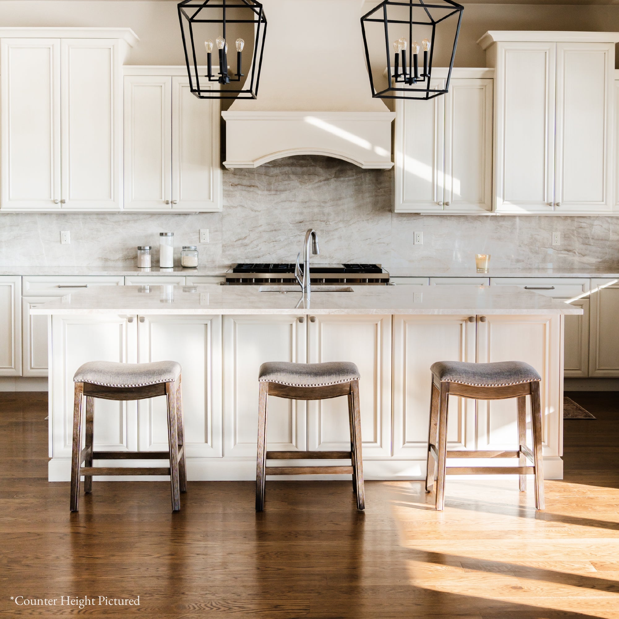 Adrien Saddle Bar Stool in Brown Finish with Grey Fabric in Stools by Maven Lane