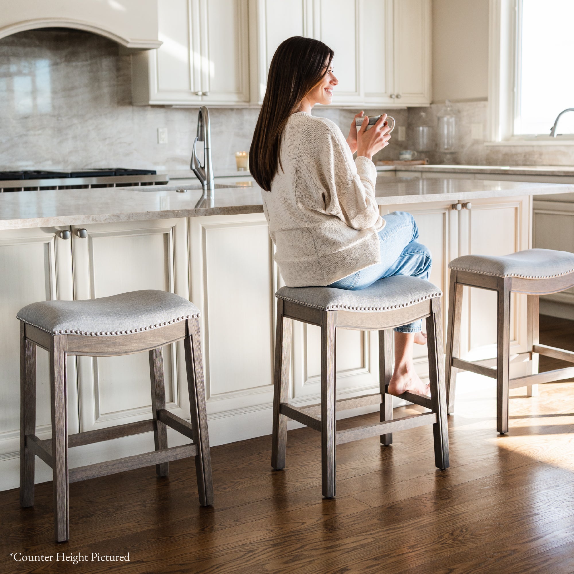 31" Adrien Saddle Bar Stool in Reclaimed Oak Finish with Ash Grey Fabric Upholstery in Stools by Maven Lane