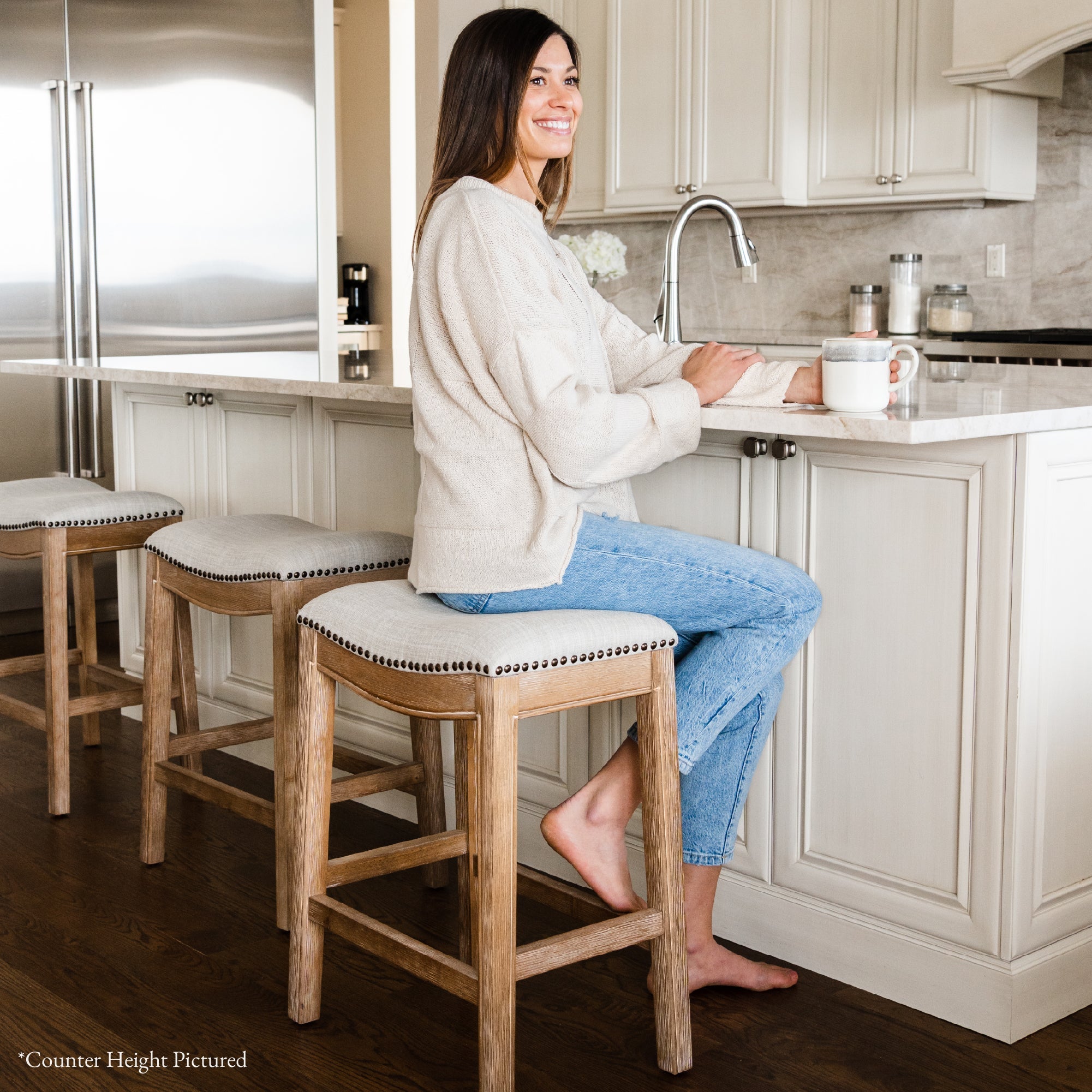 31" Adrien Saddle Bar Stool in Weathered Oak Finish with Sand Color Fabric Upholstery