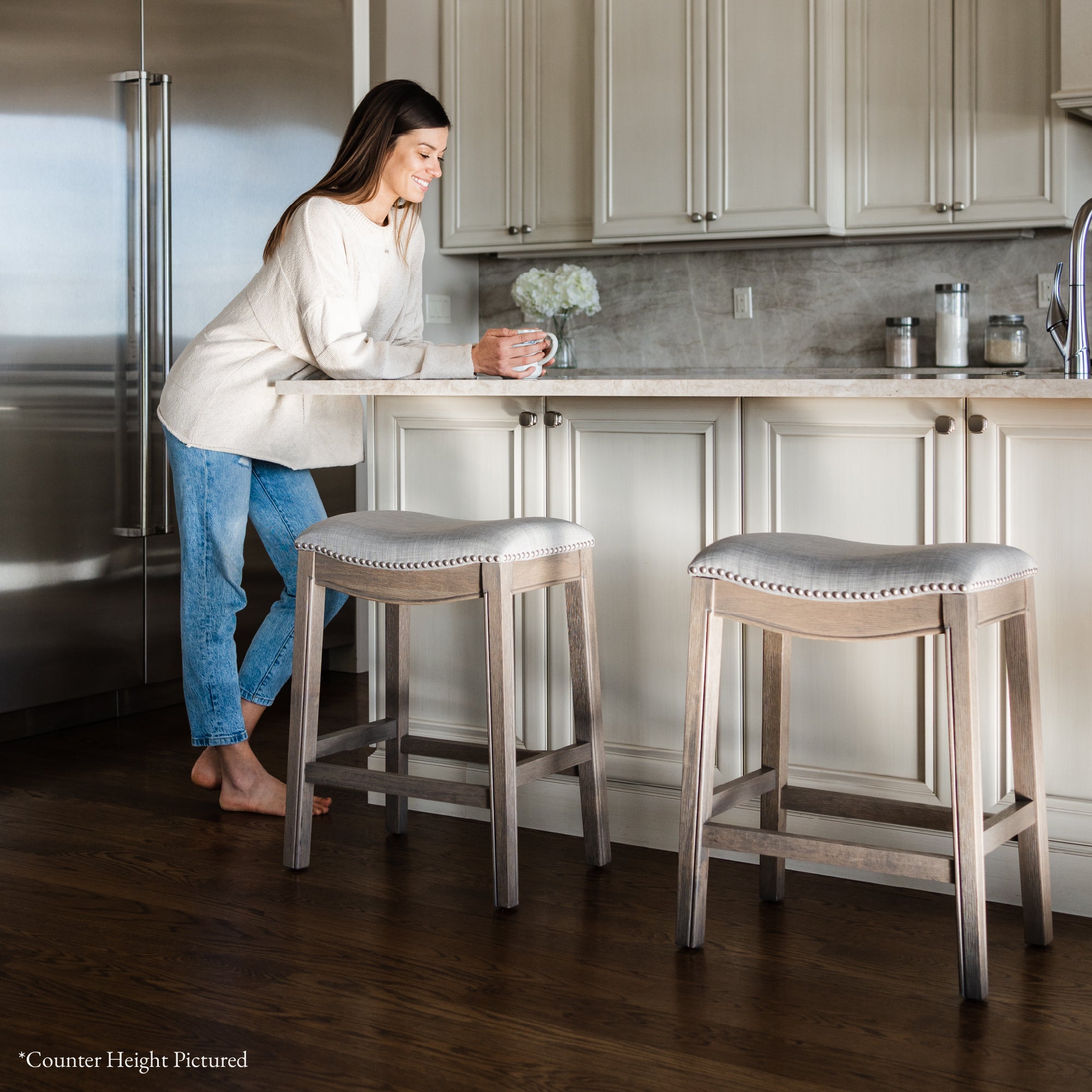 31" Adrien Saddle Bar Stool in Reclaimed Oak Finish with Ash Grey Fabric Upholstery in Stools by Maven Lane