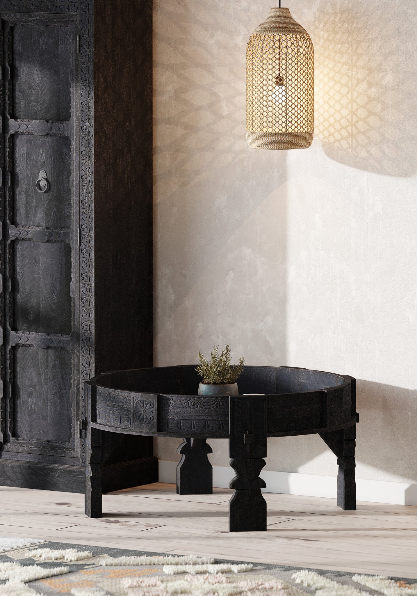 Jaya Nomad Wooden Round Coffee Table in Black Distressed Finish in Accent Tables by Maven Lane