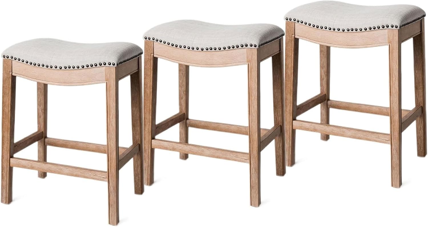 26" Adrien Saddle Counter Stool in Natural Finish with Light Grey Fabric (Set of 3) in Stools by Maven Lane