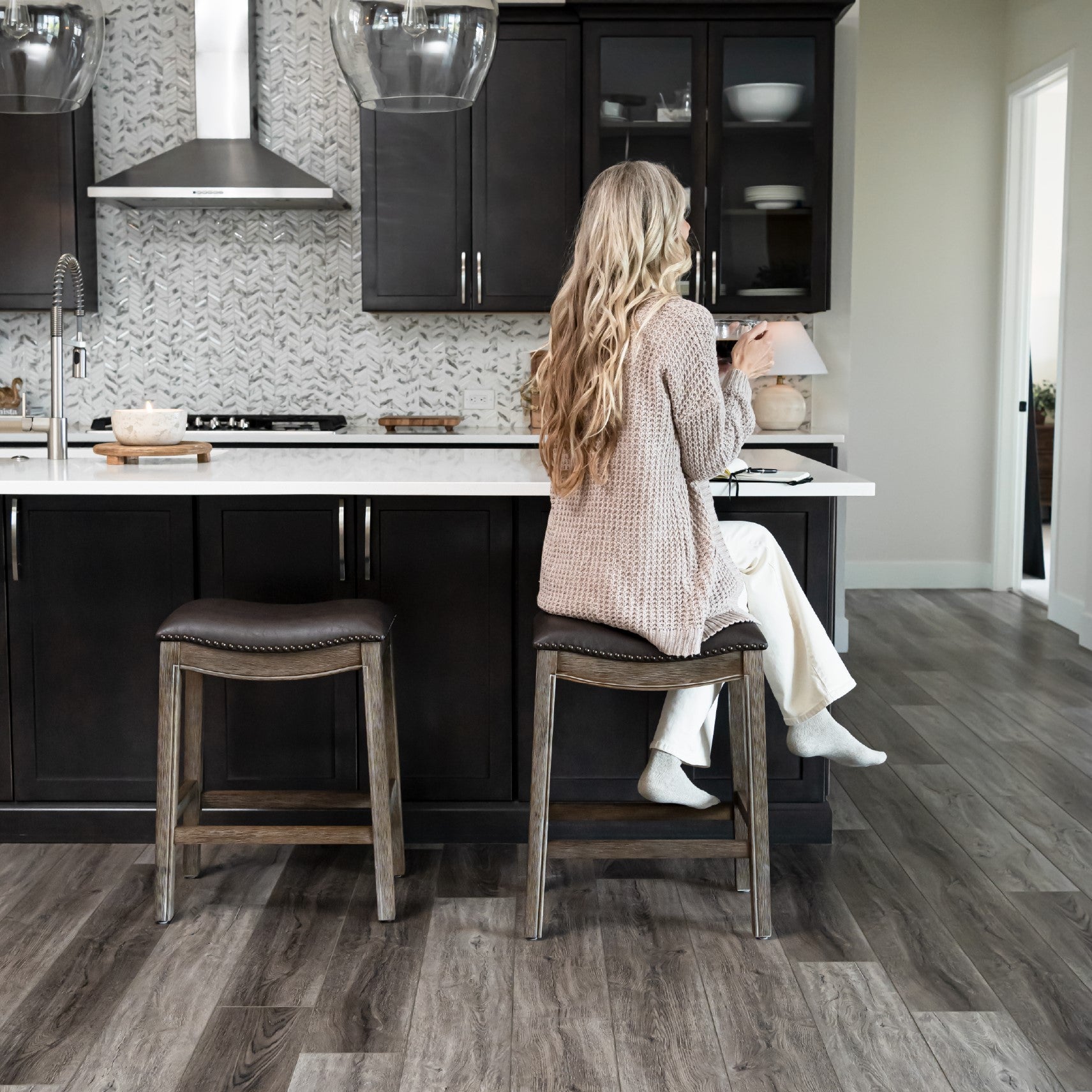 Adrien Saddle Counter Stool in Brown Finish with Dark Brown Faux Leather in Stools by Maven Lane