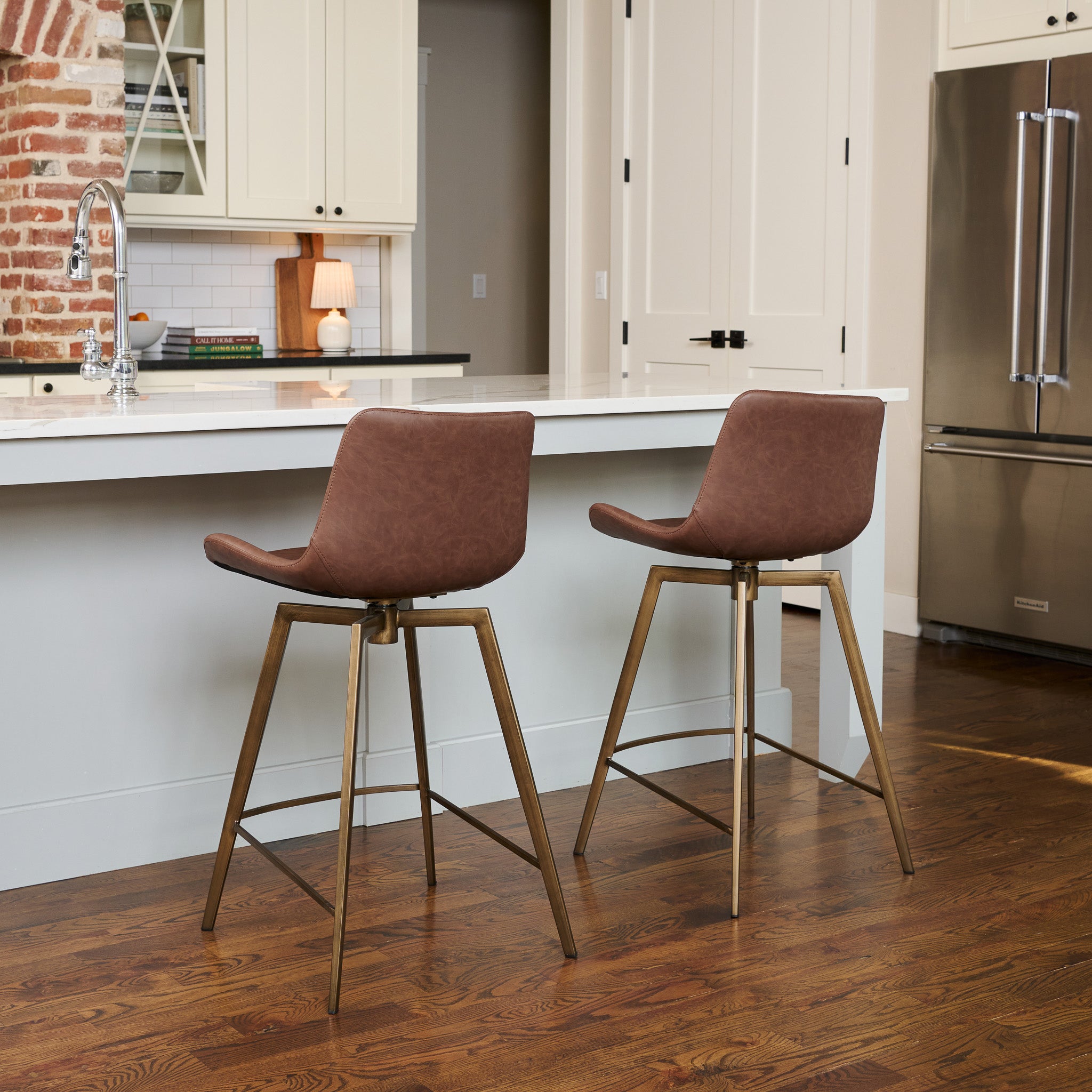 26" Victor Counter Stool in Aged Gold Finish with Brown Faux Leather (Set of 4) in Stools by Maven Lane