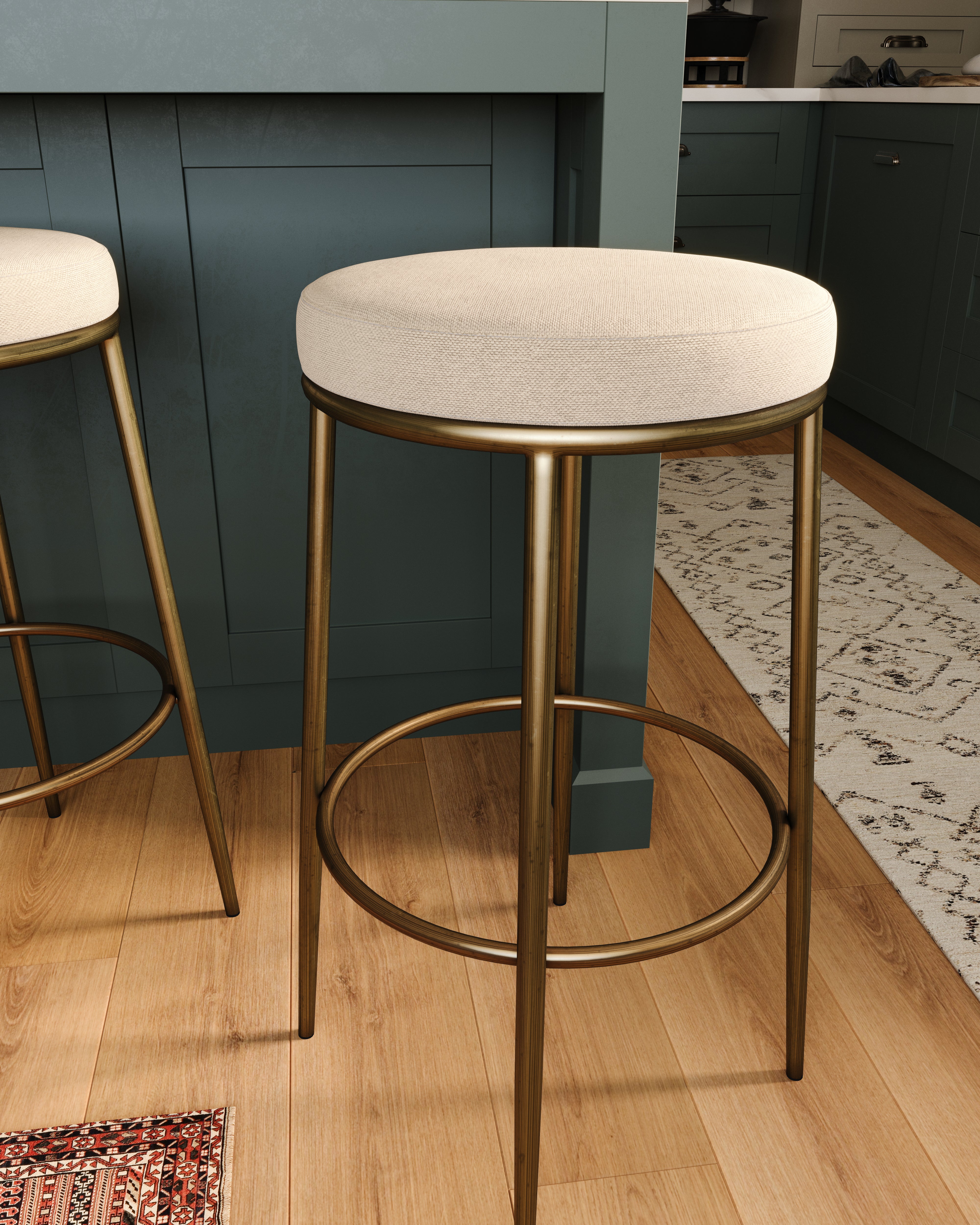 Stella Bar Stool in Antique Brass Finish with Light Beige Fabric Upholstery in Stools by Maven Lane