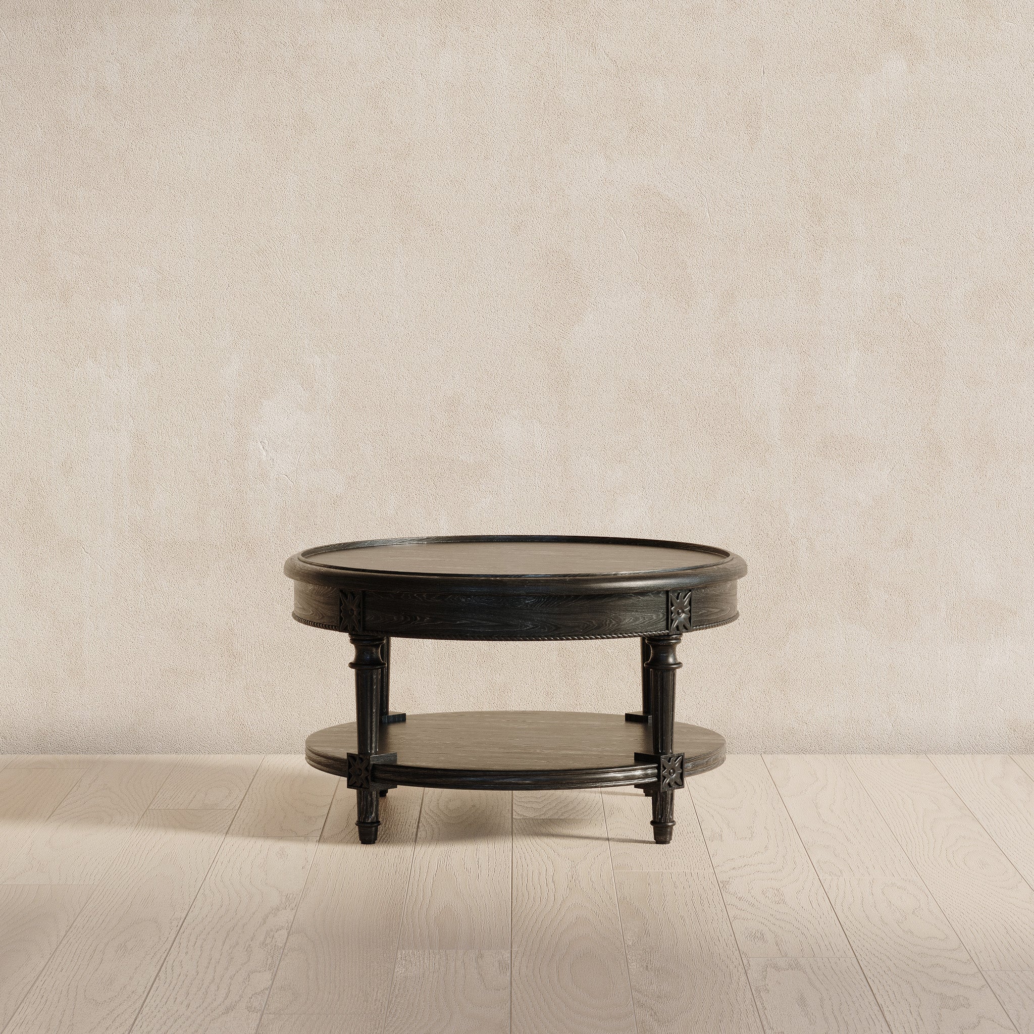 Pullman Traditional Round Wooden Coffee Table in Antiqued Black Finish in Accent Tables by Maven Lane