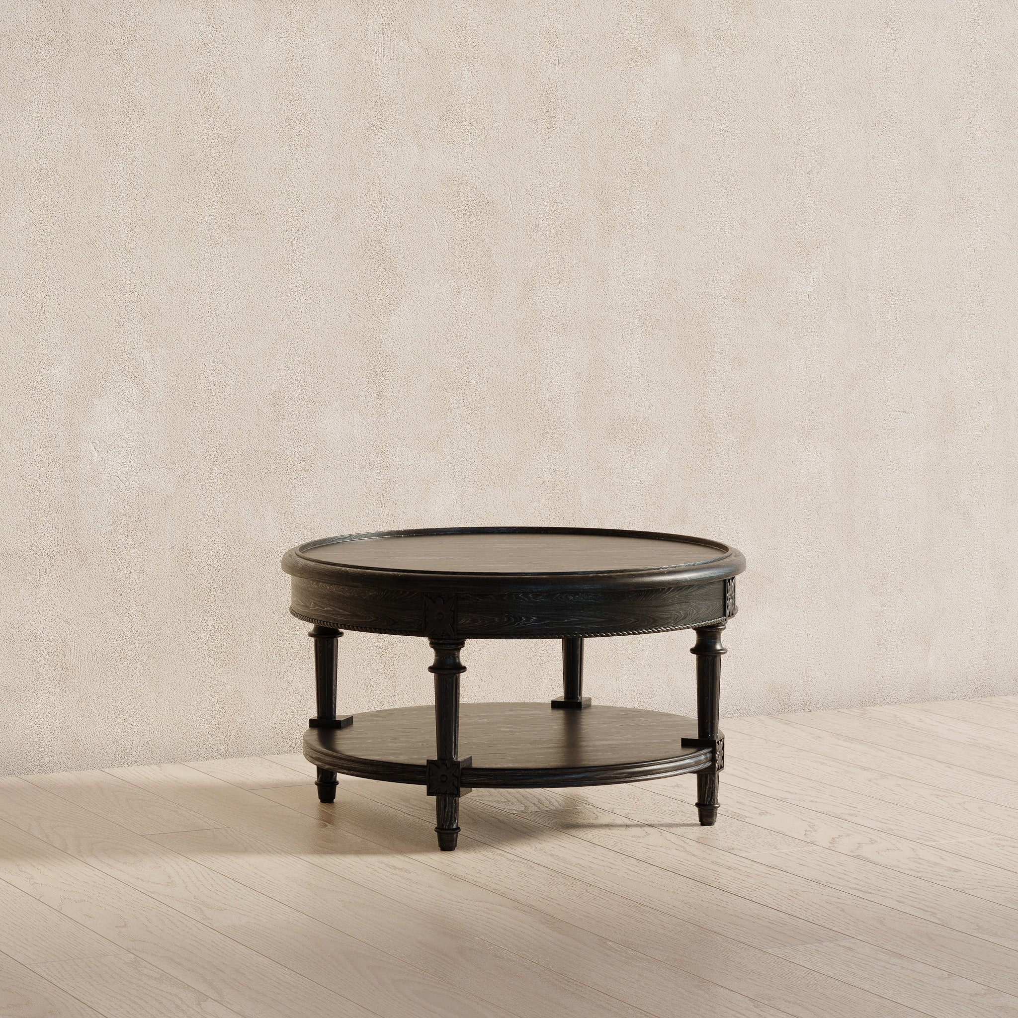 Pullman Traditional Round Wooden Coffee Table in Antiqued Black Finish in Accent Tables by Maven Lane