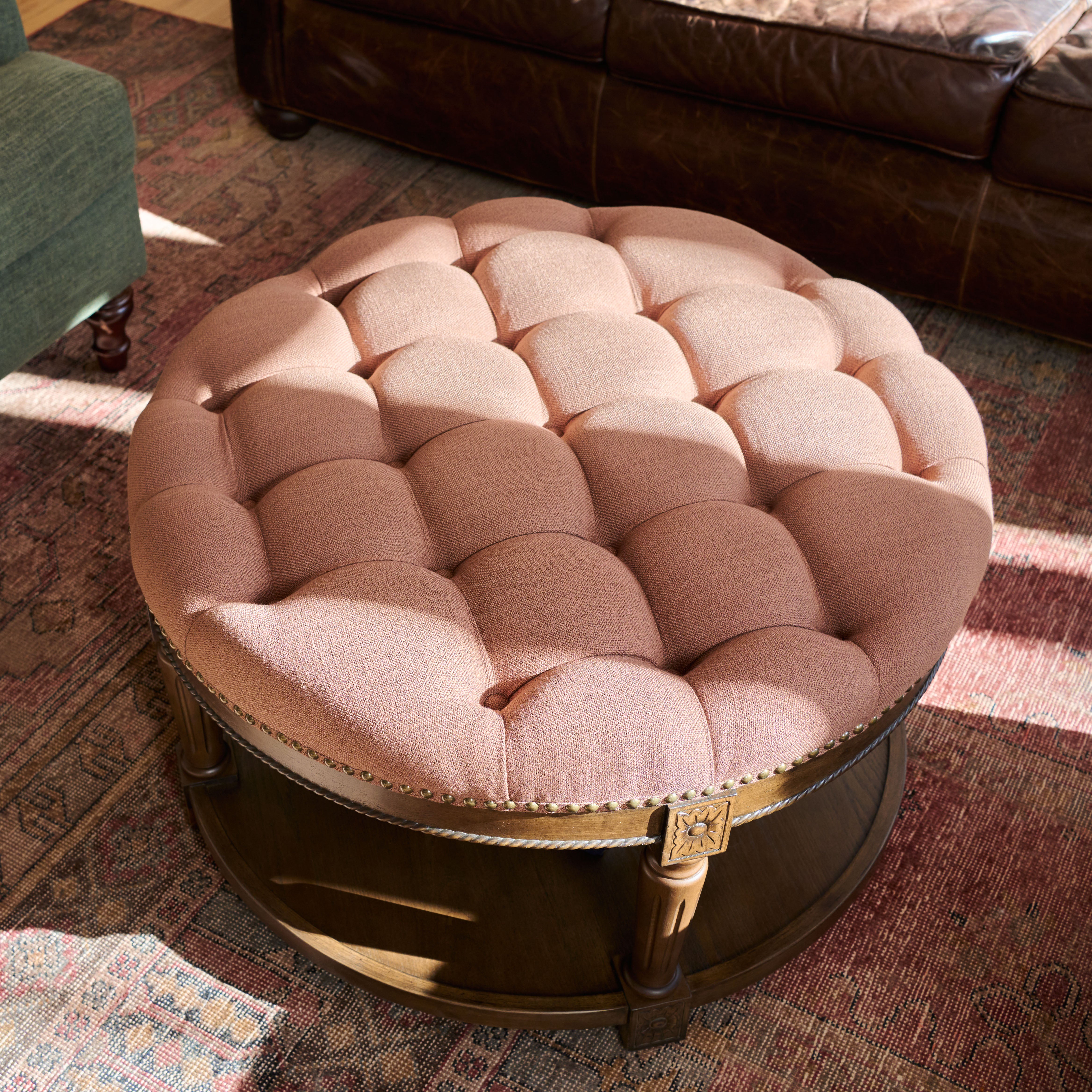 Mesa Round Upholstered Coffee Table in Brown Finish and Brown Fabric Upholstery in Coffee Table by Maven Lane