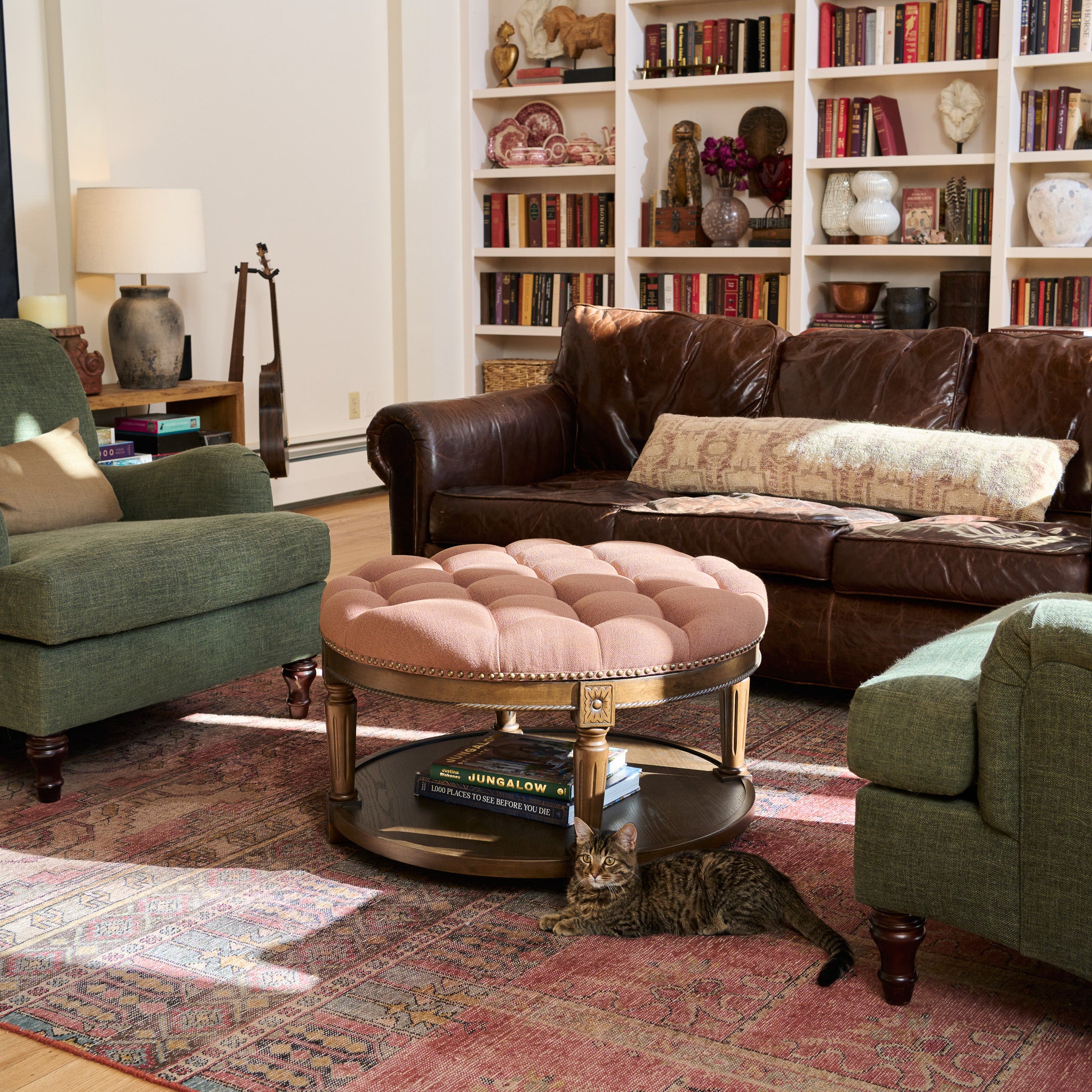 Mesa Round Upholstered Coffee Table in Brown Finish and Brown Fabric Upholstery in Coffee Table by Maven Lane