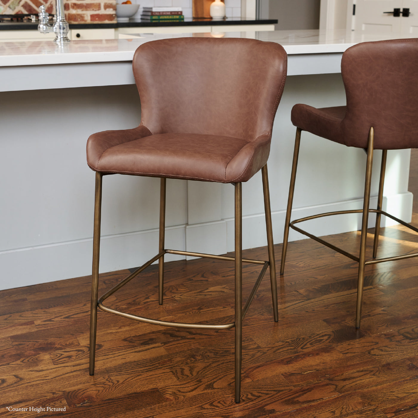 Naomi Bar Stool in Aged Gold Finish with Brown Faux Leather in Stools by Maven Lane