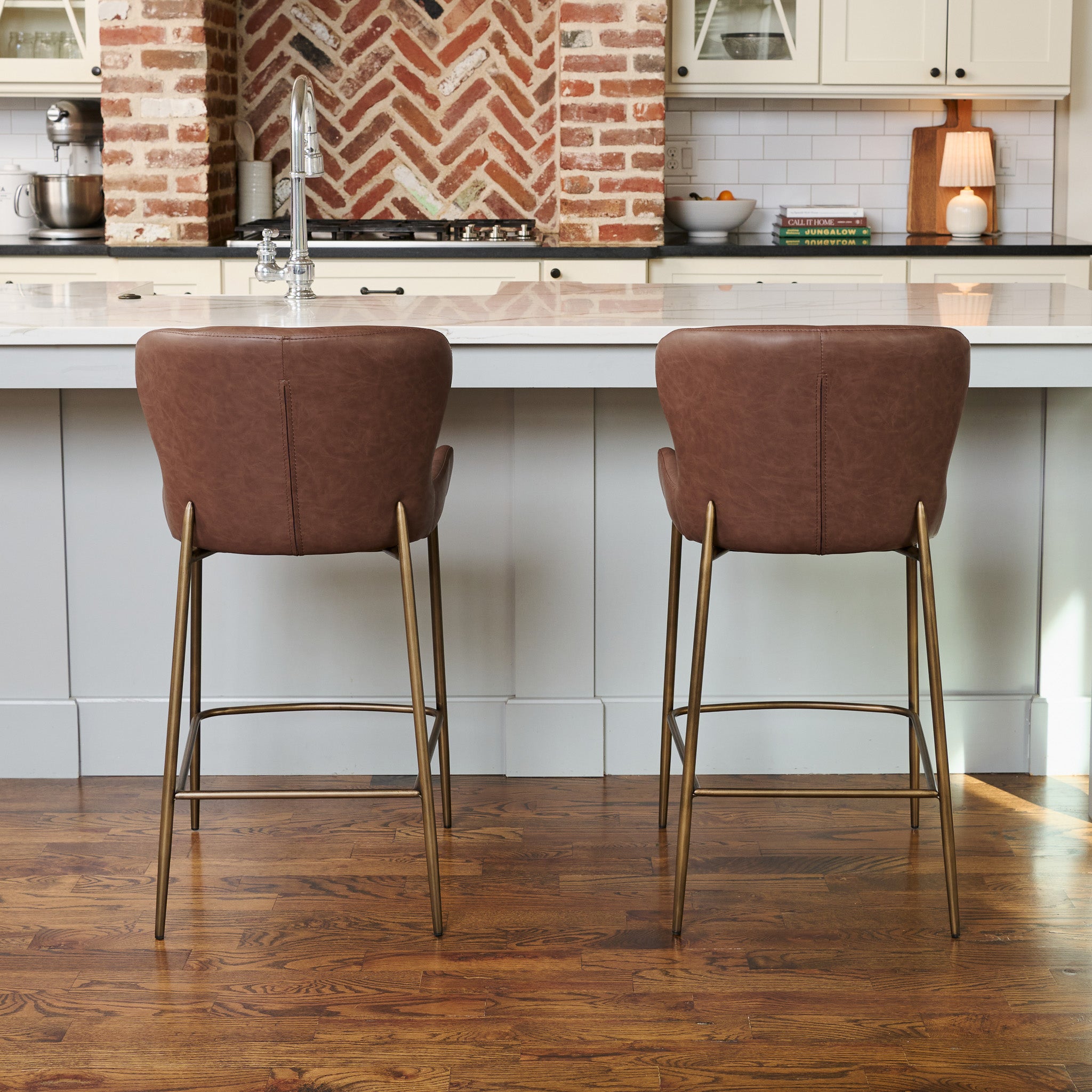 26" Naomi Counter Stool in Aged Gold Finish with Brown Faux Leather (Set of 4) in Stools by Maven Lane