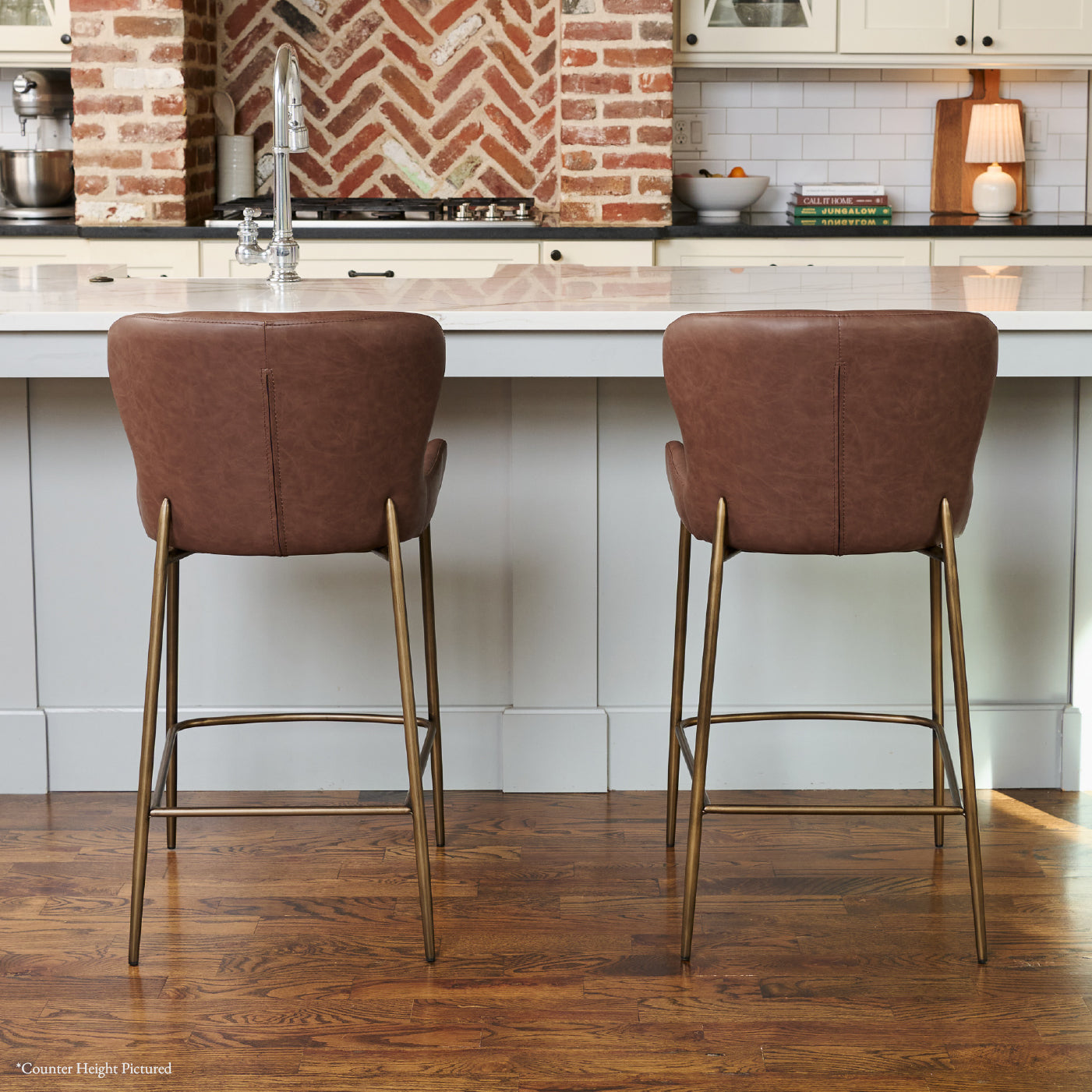Naomi Bar Stool in Aged Gold Finish with Brown Faux Leather in Stools by Maven Lane