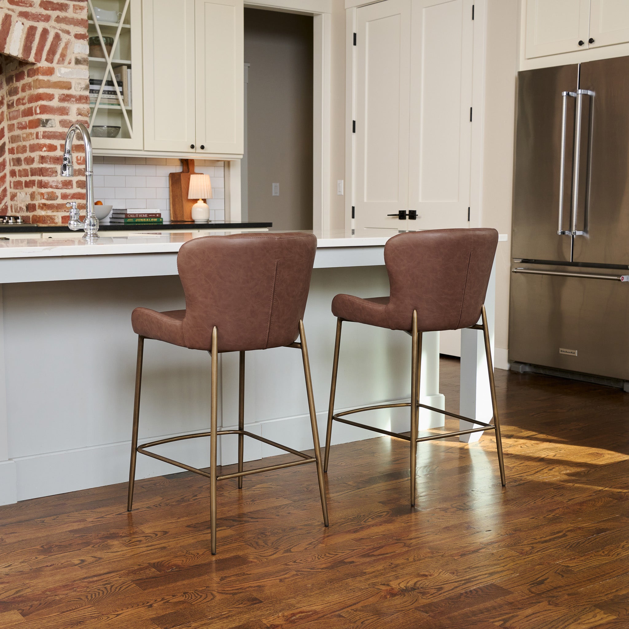 26" Naomi Counter Stool in Aged Gold Finish with Brown Faux Leather (Set of 4) in Stools by Maven Lane