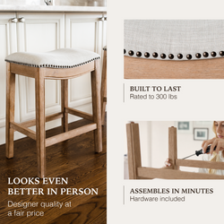 Adrien Saddle Counter Stool in Natural Finish with Light Grey Fabric Upholstery in Stools by Maven Lane