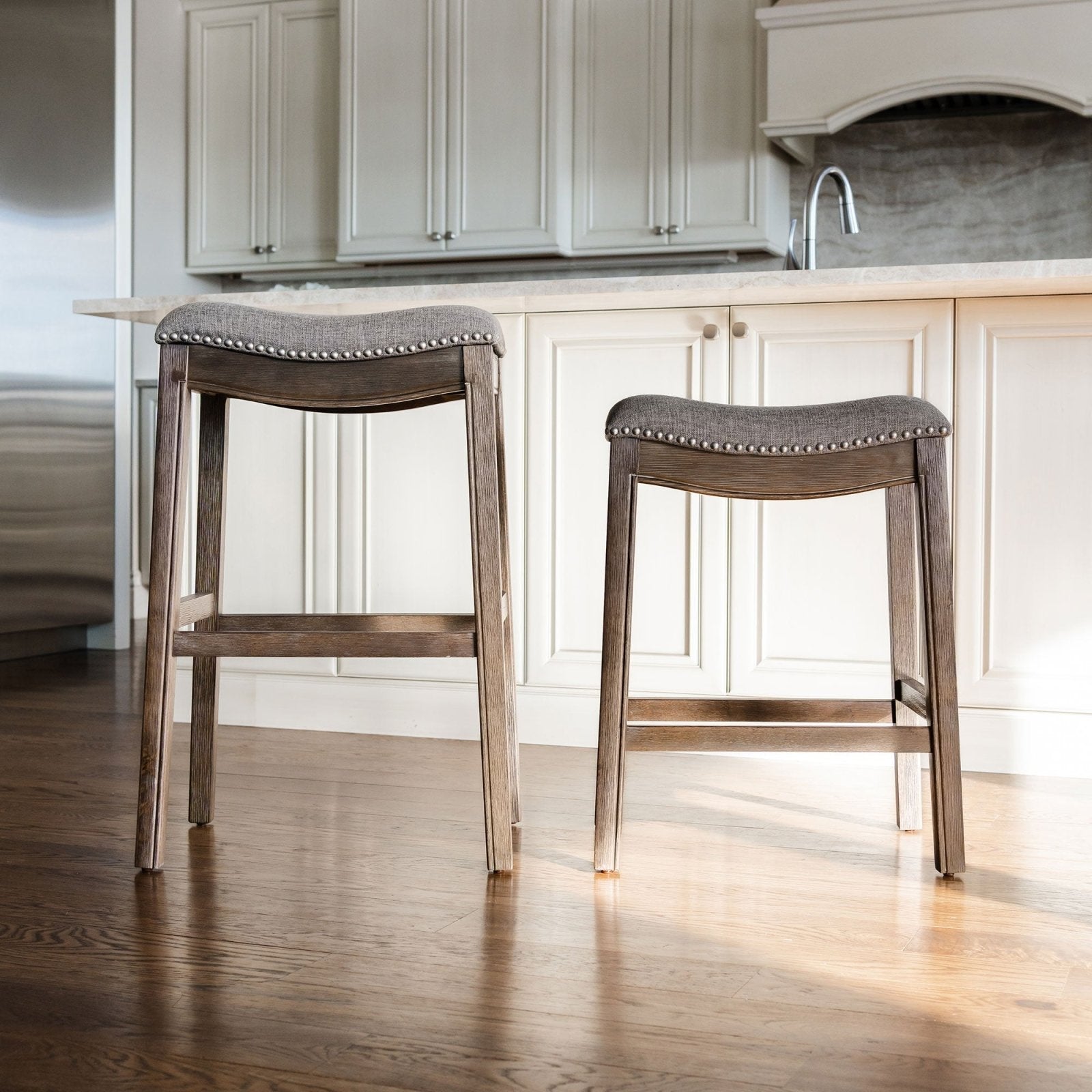 Adrien Saddle Counter Stool in Walnut Finish with Grey Fabric Upholstery in Stools by Maven Lane