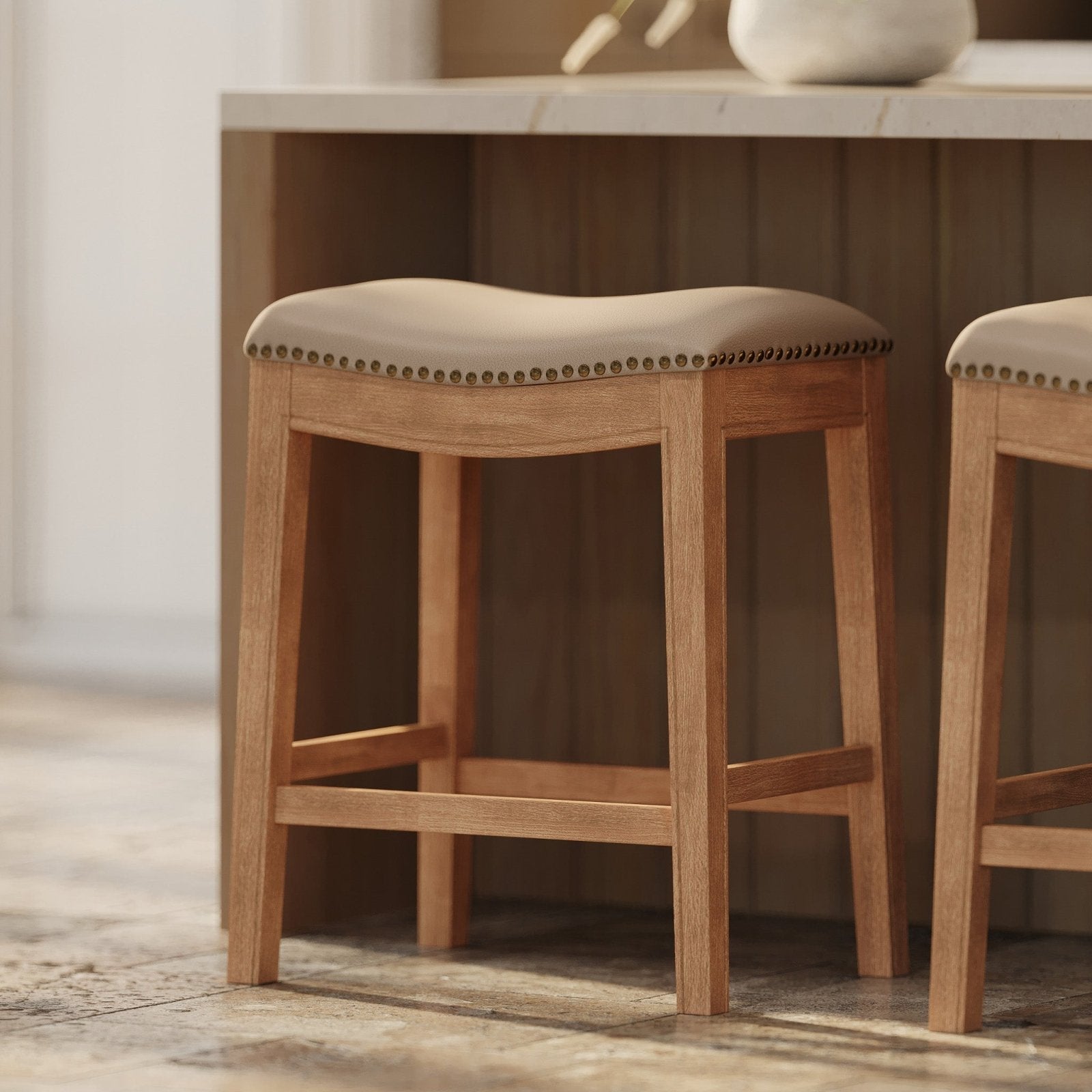 Adrien Saddle Counter Stool in Weathered Oak Finish with Avanti Bone Vegan Leather in Stools by Maven Lane