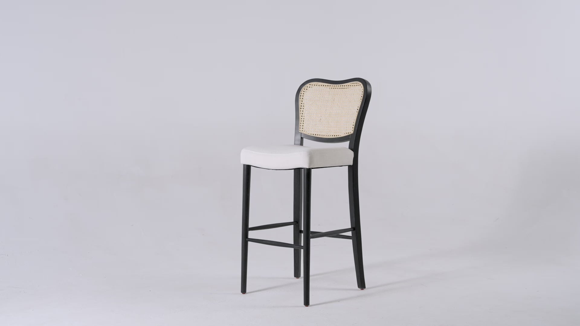 Vera Counter Stool In Aged Black With Snow White Upholstery in Stools by Maven Lane