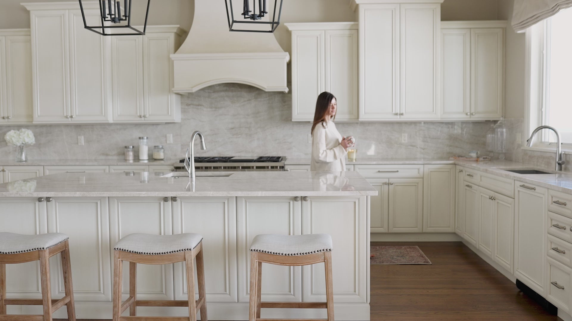 Adrien Saddle Bar Stool in Natural Finish with Light Grey Fabric in Stools by Maven Lane