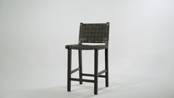 Noah Counter Stool In Black Finish & Dark Grey Woven Faux Leather Seat in Stools by Maven Lane
