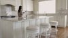 Pullman Backless Counter Stool in White Finish with Cream Fabric in Stools by Maven Lane