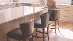 Hugo Bar Stool in Brown Finish with Dark Brown Faux Leather Upholstery in Stools by Maven Lane