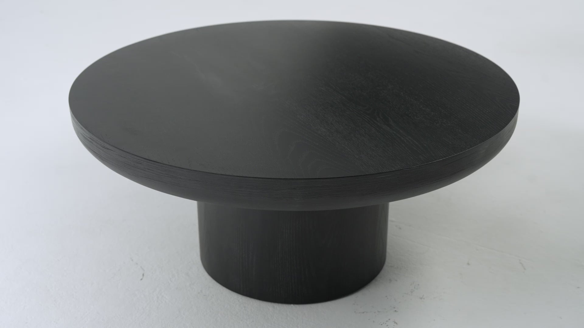 Owen Rustic Circular Wooden Coffee Table In Aged Black in Accent Tables by Maven Lane