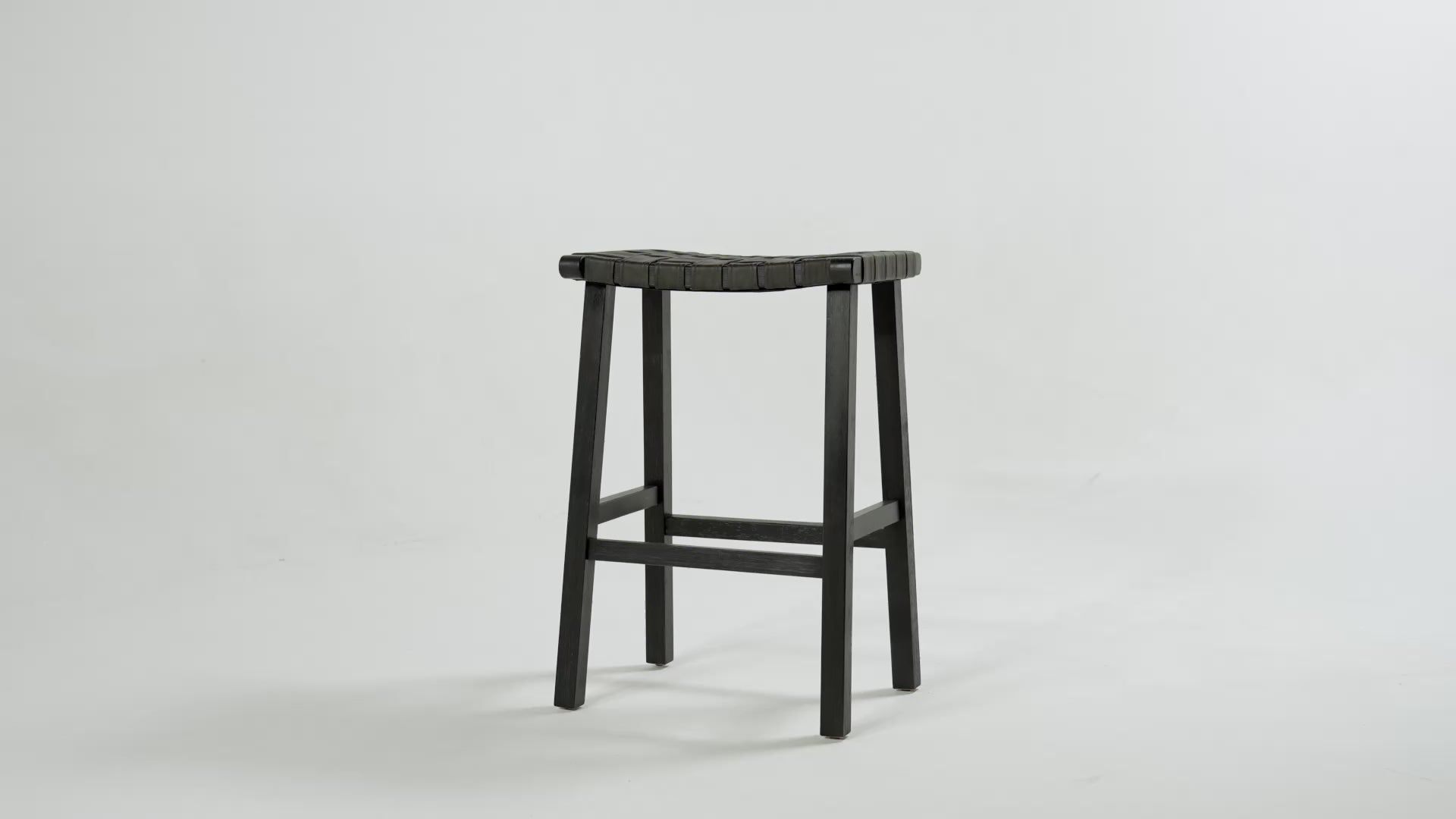 Noah Backless Bar Stool In Aged Black Finish With Charcoal Black Vegan Leather in Stools by Maven Lane