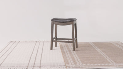 26" Adrien Saddle Counter Stool in Brown Finish with Dark Brown Faux Leather (Set of 3) in Stools by Maven Lane