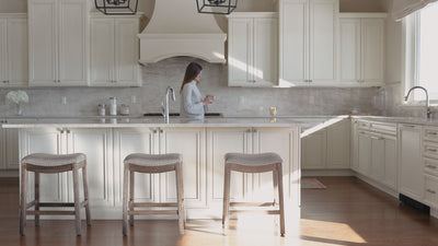 26" Adrien saddle counter height kitchen stool - walnut finish with grey fabric upholstery in Stools by Maven Lane