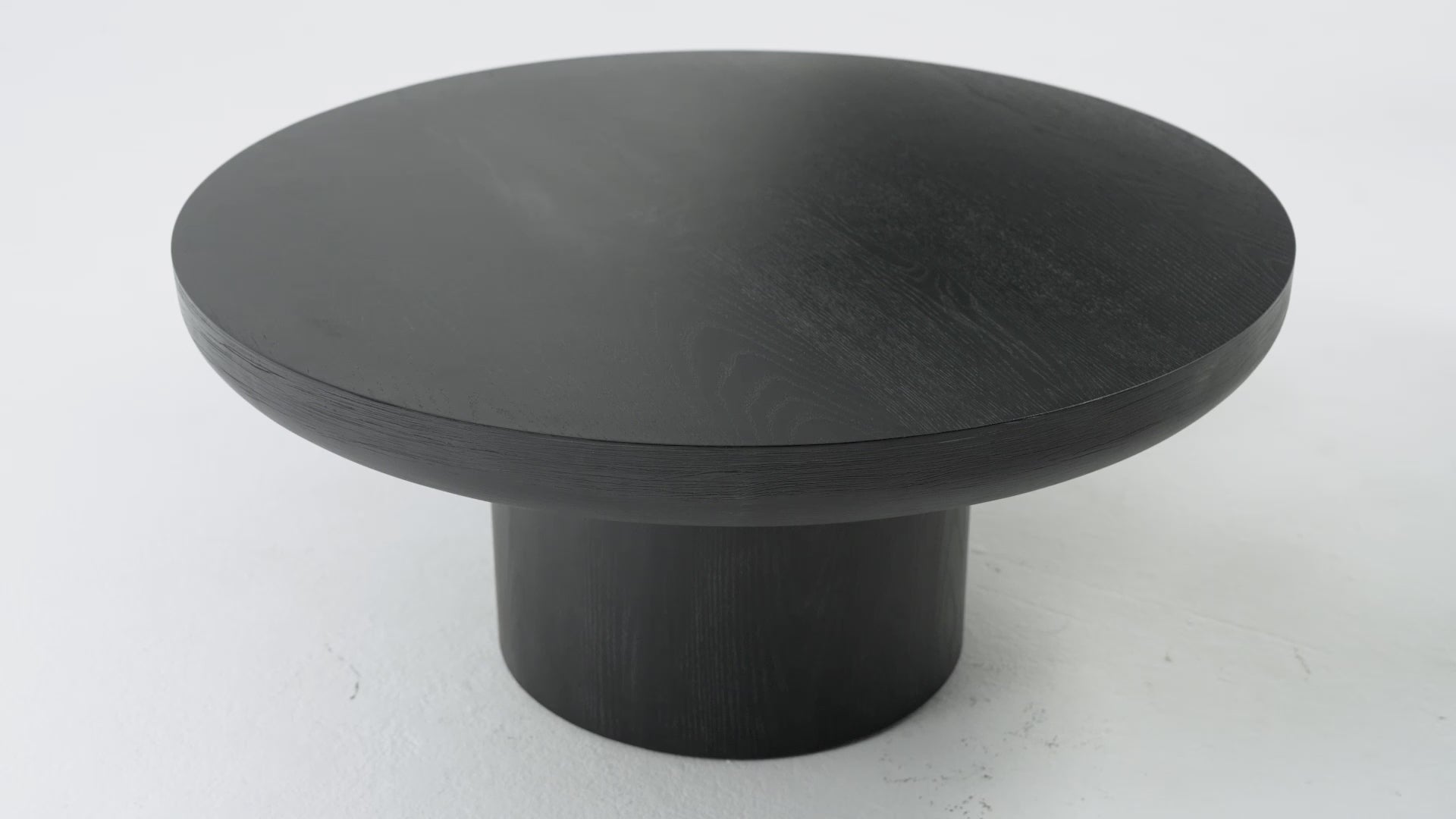 Owen Rustic Circular Wooden Coffee Table in Aged Black in Accent Tables by Maven Lane