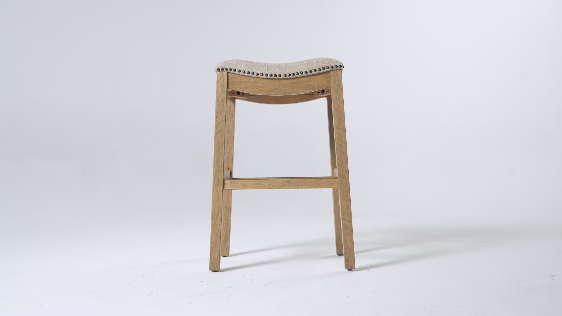 Alex Bar Stool in Aged Natural Finish with Wheat Fabric Upholstery in Stools by Maven Lane