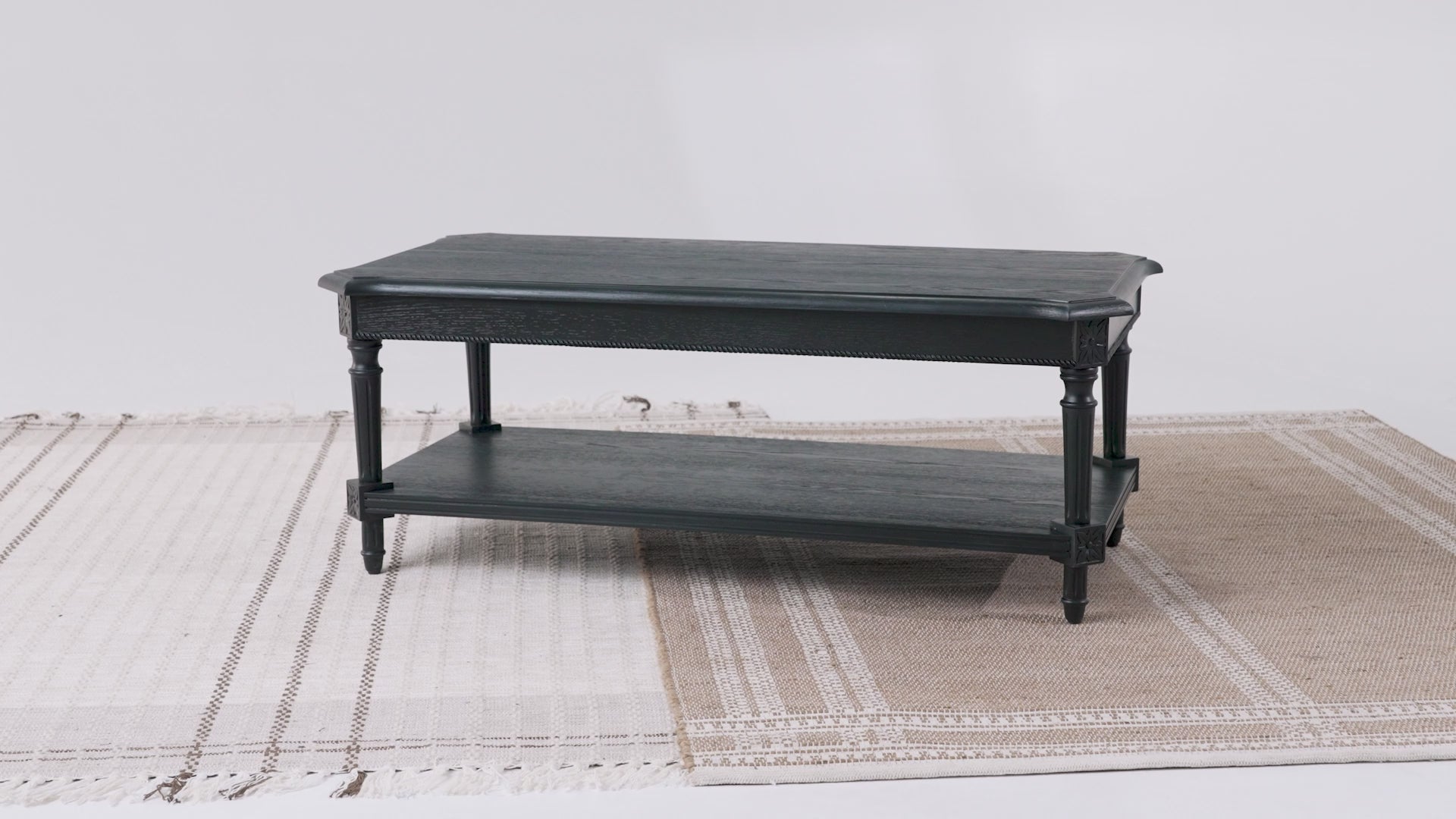 Pullman Traditional Rectangular Wooden Coffee Table in Antiqued Black Finish in Accent Tables by Maven Lane