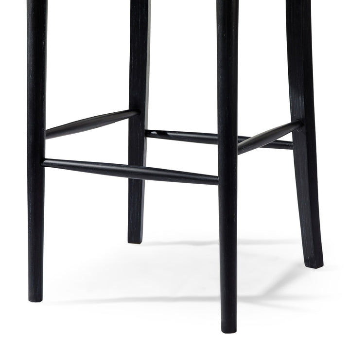 Vera Bar Stool In Aged Black With Snow White Upholstery in Stools by Maven Lane