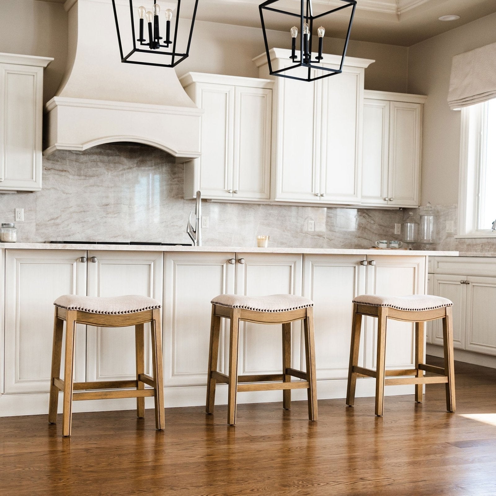 Adrien Saddle Counter Stool in Natural Wood Finish with Wheat Fabric Upholstery in Stools by Maven Lane