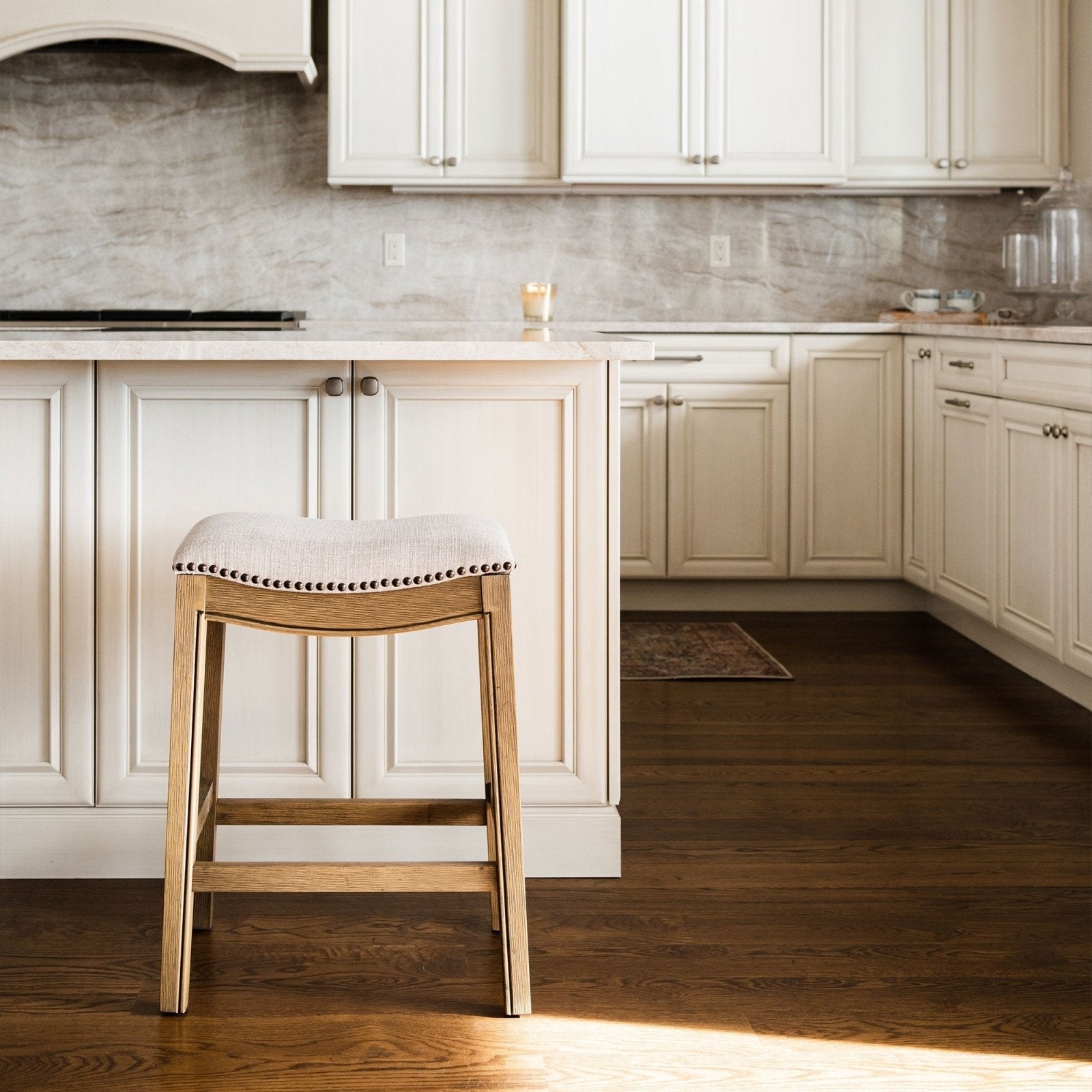 Adrien Saddle Counter Stool in Natural Wood Finish with Wheat Fabric Upholstery in Stools by Maven Lane