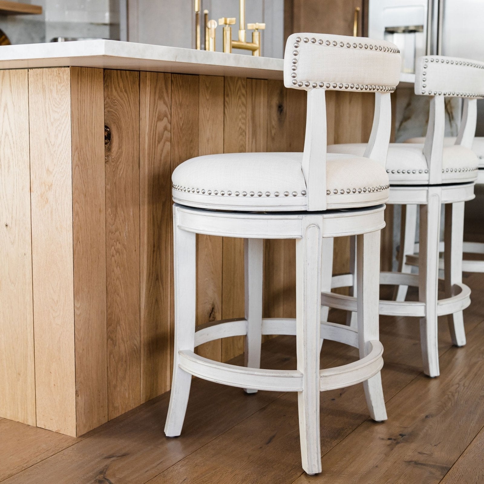 White fabric bar stools with 2024 backs